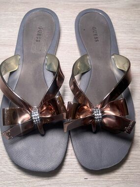GUESS Rose Gold Bow Jelly Sandals with Rhinestone Accent 5.5